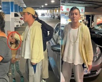 陈冠希国外与亲友聚餐，脸部皱纹突出显苍老，和美女合影面色红润