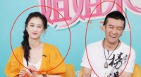 婚变传闻后，黄圣依现身酒店门口，被壮硕帅哥搂肩合影，引起热议