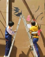 庭院大墙绘春色，这个社区美翻了