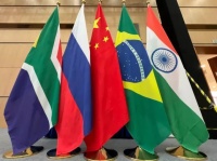 “正考虑请中国主办”