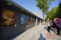 “潮起亮马河”艺术精品展开幕，12米长卷展示河畔风光