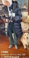 李勤勤收养周海媚的爱犬