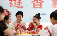 龙舟漾遗风 粽情系家国——品端午情怀新气象