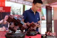 山东滕州举行鲁班文化节系列活动 鲁班锁引关注