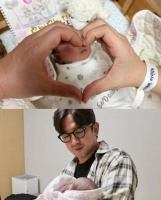 神话组合李玟雨晒照公布妻子产女喜讯 46岁初为人父满脸喜悦