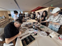 书画名家“文艺六进”走进金融一线